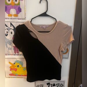 Black and cream color shirt.